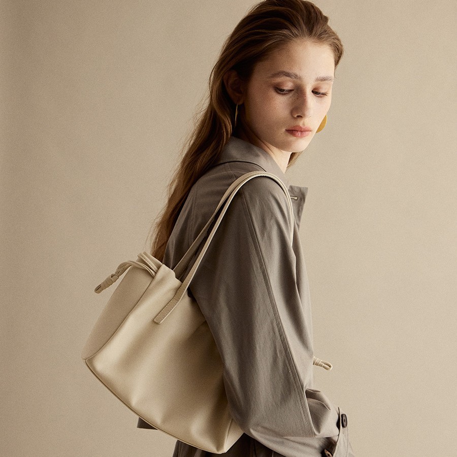 2026 New Tote Bag Cowhide Leather French Ruched Underarm Bag Spring Summer Shoulder Genuine Leather Women's Commuter Bag