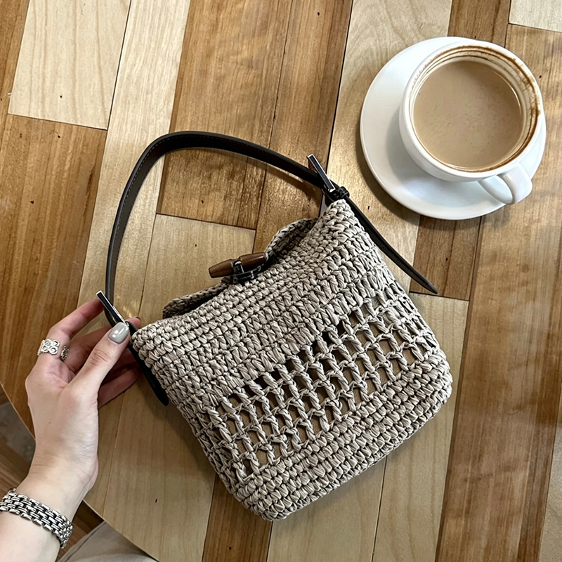 French Style Straw Woven Bag 2026 New Arrival PP Straw Horn Buckle Hollow Out Woven Vacation Handheld Bucket Bag Crossbody Bag - Thumbnail 6